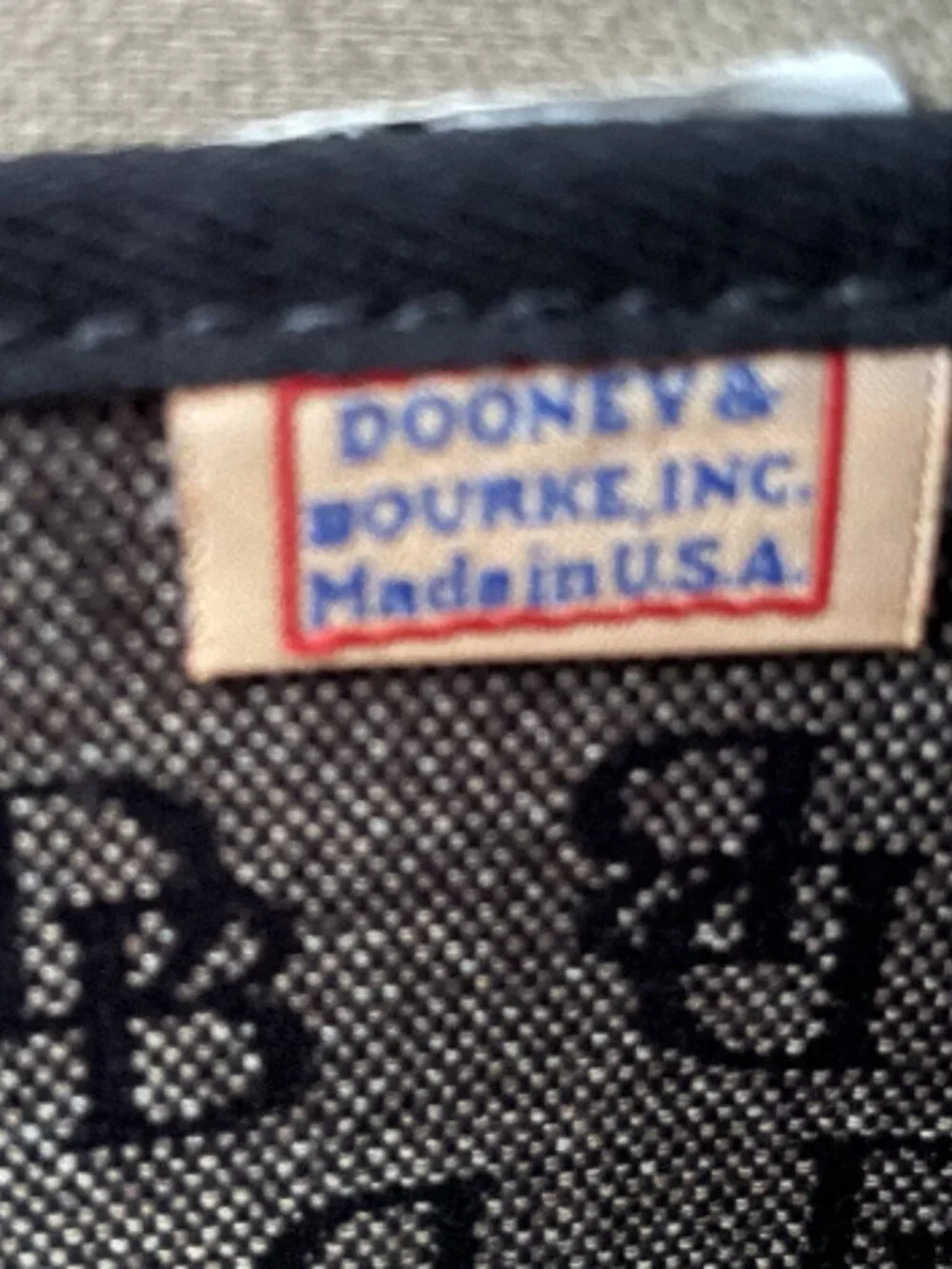 Dooney & Bourke signature monogram bucket tote
